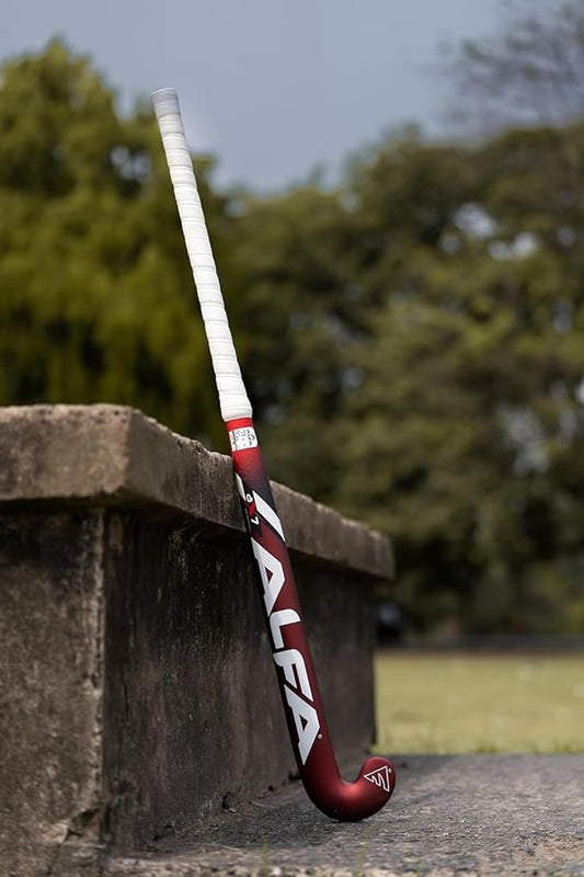 ALFA AX7 Hockey Stick | Color: Red | Material: 70% Carbon Composite | Gender: Unisex | Extra Low Bow for Drag Flicks | Optimized Lightweight Design | Durable High-Performance Stick | Versatile for All Playing Styles | Comes with Stick Bag.
